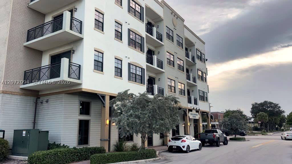 Photo of 4100 SW 64th Ave #408, Davie, FL 33314 (MLS # A12072094)