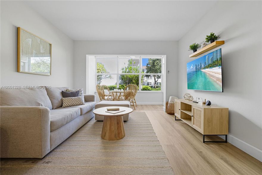 Priced to Sell - Just Reduced and ready for its next owner! Beautifully updated 1BR/1.5BA first-floor condo featuring an enclosed patio with impact windows—ideal for extra living space or a home office. Bright open-concept kitchen with quartz countertops, wood-look vinyl flooring throughout, and updated bathrooms. Rare unit with parking directly outside your front door and just steps from the laundry room. Offered fully furnished, including TVs, beds, dining and living room sets—truly turnkey. Strong investor opportunity with ability to rent up to 12x per year. Walk to beach access, heated pool, and clubhouse. Ideal as a seasonal getaway, full-time residence, or income-producing property—this one will not last.