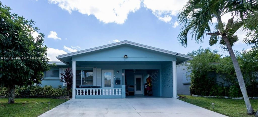 Photo of 4518 NW 45th Ct, Tamarac, FL 33319 (MLS # A12007754)