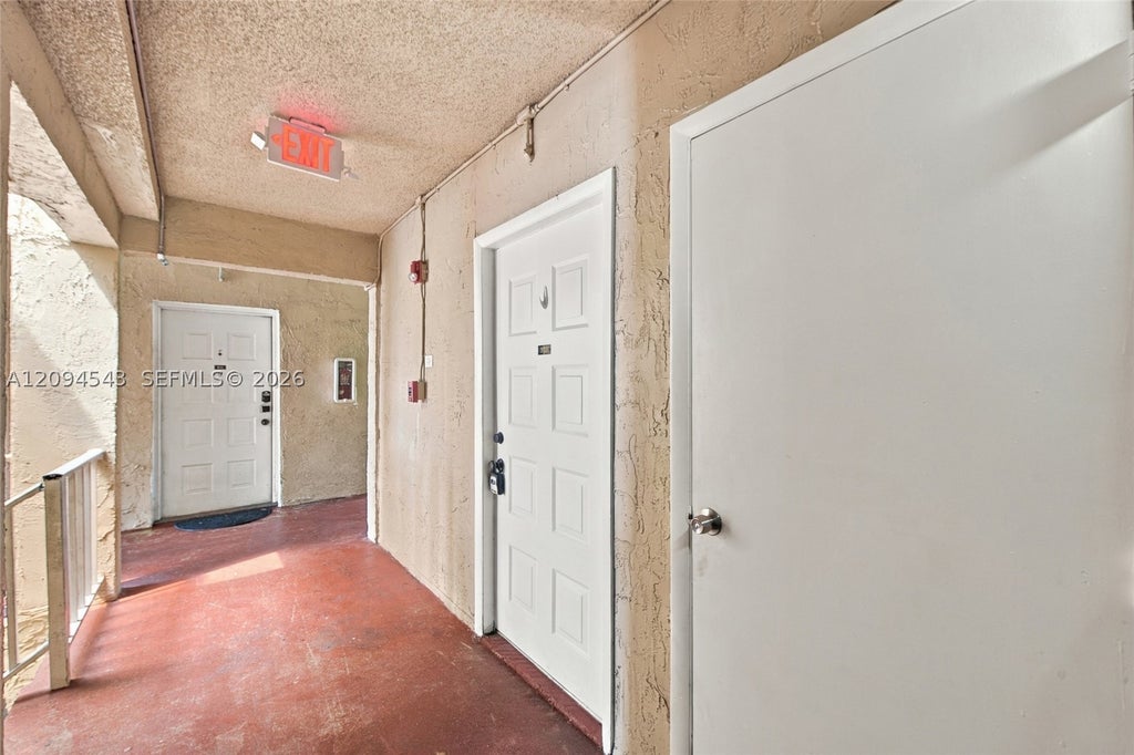 Photo of 2700 Riverside Dr #302-B, Coral Springs, FL 33065 (MLS # A12094543)