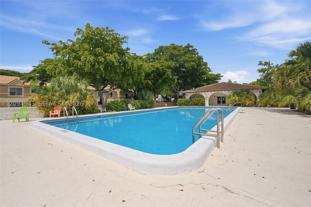 Photo of 2700 Riverside Dr #302-B, Coral Springs, FL 33065 (MLS # A12094543)