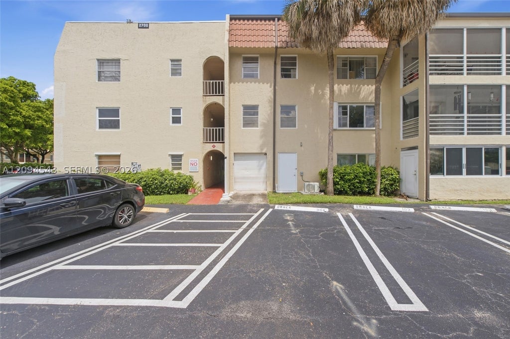 Photo of 2700 Riverside Dr #302-B, Coral Springs, FL 33065 (MLS # A12094543)