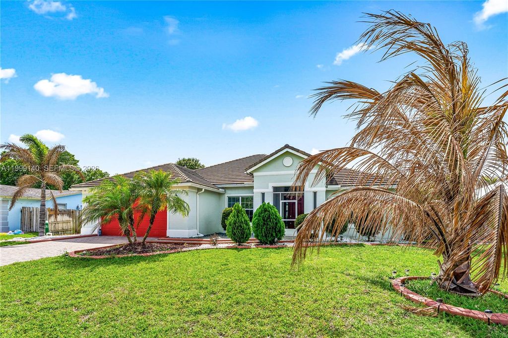 Photo of 898 SW Curtis St, Port St Lucie, FL 34983 (MLS # A11999140)