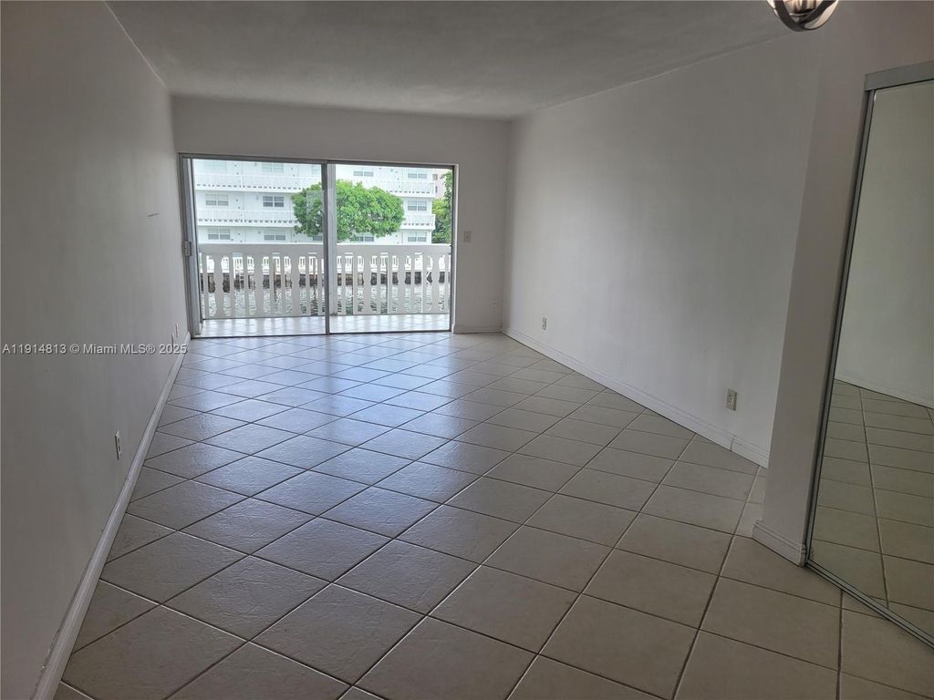 Photo of 440 Paradise Isle Blvd #209, Hallandale Beach, FL 33009 (MLS # A11914813)