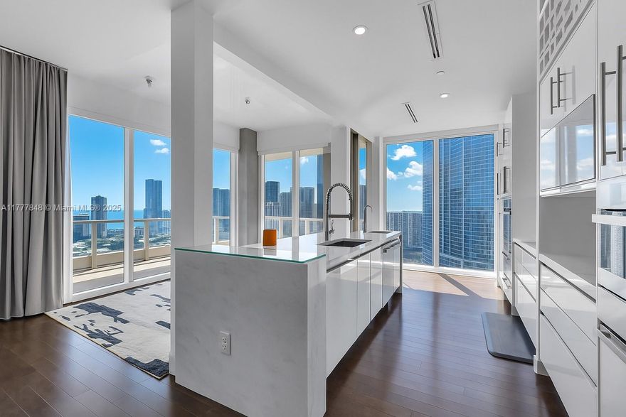 Welcome to Unit 2904 at Asia Brickell Key, a rare chance to own a high-floor residence with panoramic views of Biscayne Bay and the Miami skyline. This 3-bed + den, 4.5-bath home spans 2,627 SF and features private elevator access, soaring ceilings, and floor-to-ceiling windows that fill the space with natural light. The chef’s kitchen boasts premium appliances and custom finishes. Enjoy private balconies with sunrise and sunset views. Asia offers resort-style amenities including a pool, fitness center, spa, concierge, valet, and 24/7 security. All just steps from Brickell’s top restaurants, shops, and culture.