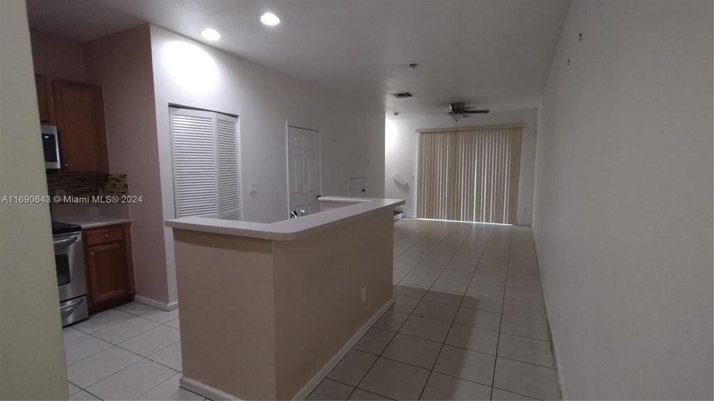 Photo of 6808 Cypress Walk Ter, Tamarac, FL 33321 (MLS # A11690643)