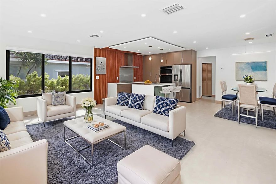 Experience the feeling of a new home in this beautiful, never-lived-in renovated corner property designed for modern living & entertaining. This 3-bed, 3-bath POOL home showcases exquisite craftsmanship throughout, featuring impact windows & doors, new roof, zebra blinds, & stunning finishes. The chef’s kitchen impresses with Italian cabinetry, brass hardware, waterfall countertops, & all-new Samsung appliances. Every bathroom is a showpiece w/ floating vanities, lighted mirrors, brass fixtures, & custom marble niches behind glass enclosures. Enjoy new porcelain tile flooring, recessed lighting, updated electrical & plumbing, & a spacious laundry room. The covered patio opens to a sparkling pool & fenced backyard w/ room for an RV or boat, 24x24 pavers, & custom exterior lighting.