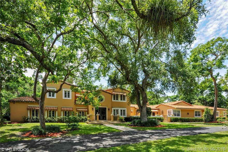 Elegance, charm and ambiance combine to make this Old Spanish 6 bedroom 6.5 bath home on over 2 acres in exclusive Gables Estates a one of a kind! Stunning foyer entry leads to a beautiful large formal living room and dining room. This home has a big, updated eat-in kitchen area and a huge family room with built-ins, perfect for family fun and entertaining. 3 bedrooms downstairs and a fabulous large master suite and 2 other bedrooms upstairs. Volume ceilings, gorgeous wood floors, impact french doors, updated bathrooms, 6 year old barrel tile roof, updated electrical and much more! A must see!