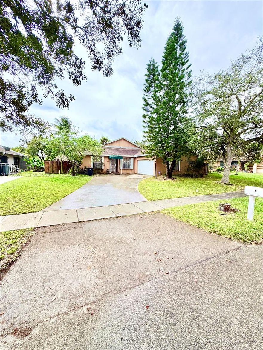 Well-maintained single-family home featuring 3 bedrooms and 2 bathrooms, situated on a generous 7,500 sq ft lot in a quiet, well-established neighborhood. This property includes a two-car garage and a functional layout with great potential. Roof was repaired in 2017. Conveniently located near the Florida Turnpike, offering easy access for commuters. No HOA. Ideal for buyers looking to personalize and add value.