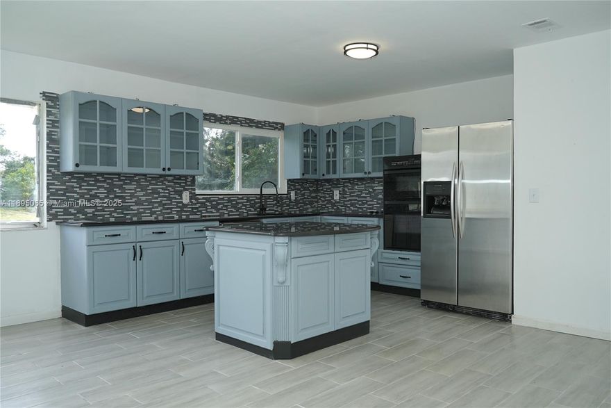 PRICED to SELL! Welcome to this updated, cozy home, nestled on a quiet cul-de-sac. This property features an open floor plan, 3 bedrooms, 2 updated bathrooms, and a spacious 1-car garage with a dedicated laundry space. The kitchen has glass-front cabinets, granite countertops, a flat cooktop, and a stainless steel refrigerator. This home is a part of the beautiful community with a low annual fee of just $225, featuring tennis and pickleball courts, a heated pool, and a clubhouse. Close to schools, parks, medical shopping and highways. Don't miss this move-in ready gem in Port St.Lucie!