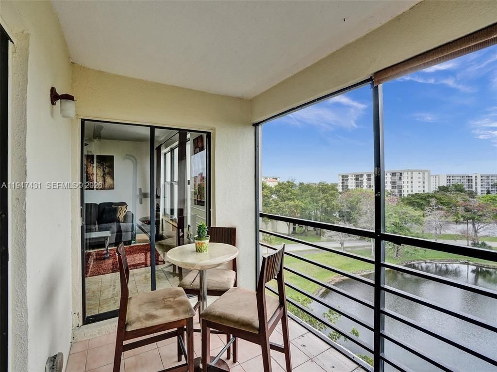Photo of 2304 S Cypress Bend Dr #712, Pompano Beach, FL 33069 (MLS # A11947431)
