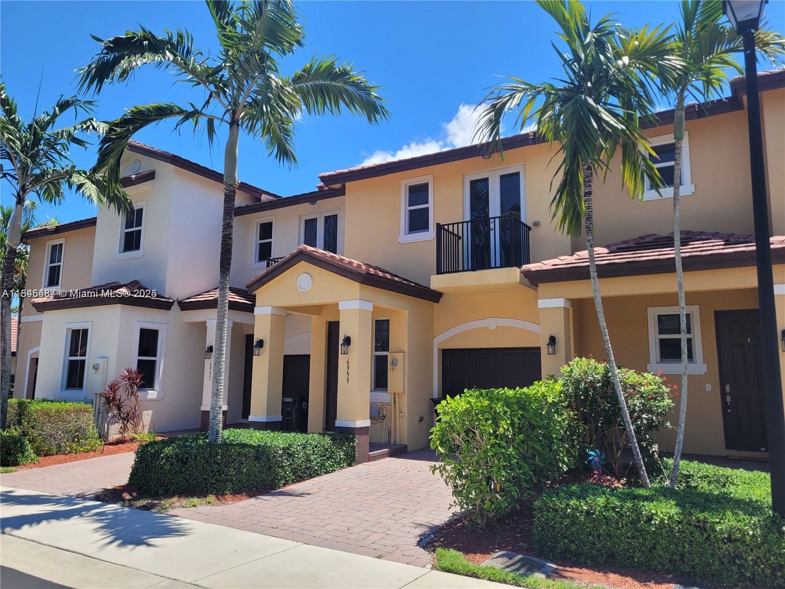 Beautiful townhome in the Community of Long Pines within the gated community in Coconut Creek City. Move-in ready! This cute townhome features hurricane impact windows and doors, an energy-efficient tankless hot water heater, stainless steel appliances, granite countertops in the kitchen and bathrooms, a nice patio in the back, 3 bedrooms, and 2.5 bathrooms with storage. Laundry room inside. The Community have a large heated pool for ultimate relaxation. Beautiful walking trail in the back of the community. Amazing location close to all major highways, shopping & restaurants. Great schools! Easy to show.