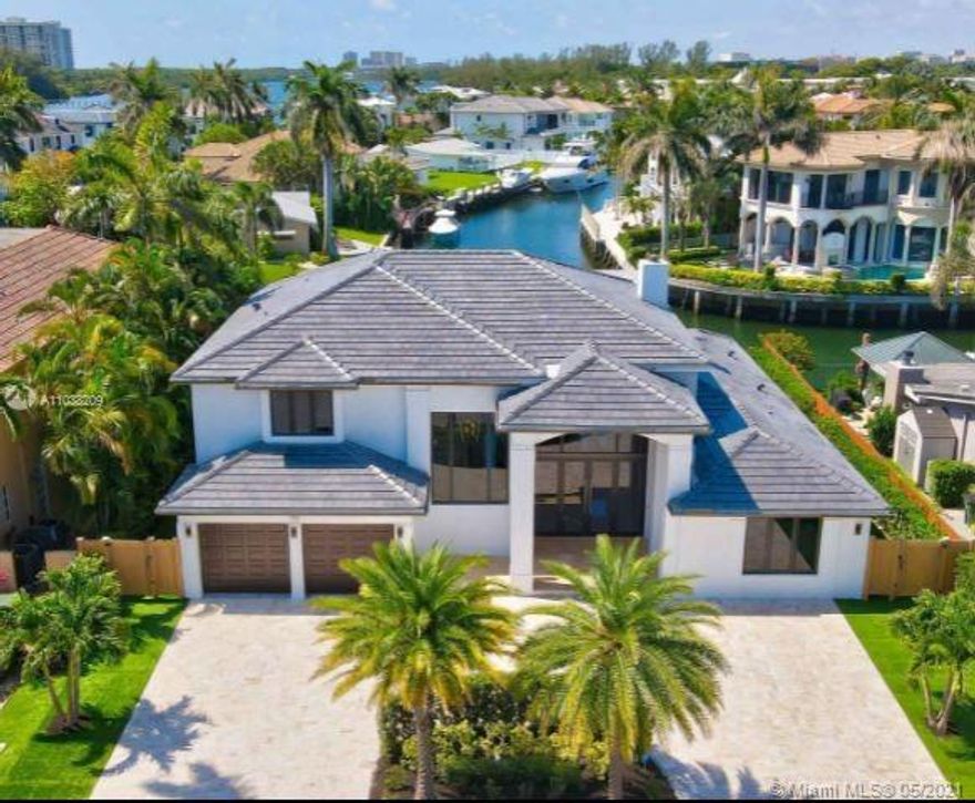THIS SPECTACULAR SOUTHERN EXPOSURE INTERSECTING CANAL DEEP WATER ESTATE BOASTS THE MOST BREATHTAKING VIEWS ON THE MARKET! BRING YOUR 85 FOOT YACHT.  THIS DEEP WATER ESTATE HAS WIDE OPEN WATER VIEWS BECAUSE IT SITS ON TWO INTERSECTING CANAL'S FOR INCREDIBLE LONG WATER VIEWS AND EASY YACHT TURNING. THIS METICULOUSLY HIGHLY DETAILED REMODELED HOME HAS THE APPEARANCE OF NEW CONSTRUCTION BECAUSE ALMOST EVERY ASPECT OF THE HOME IS NEW. THIS HOME WAS REMODELED TO THE HIGHEST QUALITY STANDARDS WITH DETAILED CRAFTSMANSHIP AND LUXURY AMENITIES.  THE MAIN LEVEL INCLUDES AN IMPRESSIVE CLUB LOUNGE AND AN ELEGANT SECOND FLOOR MASTER. OPTIONAL 4TH BEDROOM IF NEEDED.