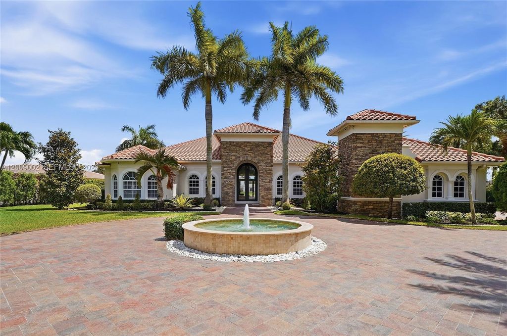 Photo of 14370 Jockey Cir N, Davie, FL 33330 (MLS # A12009002)