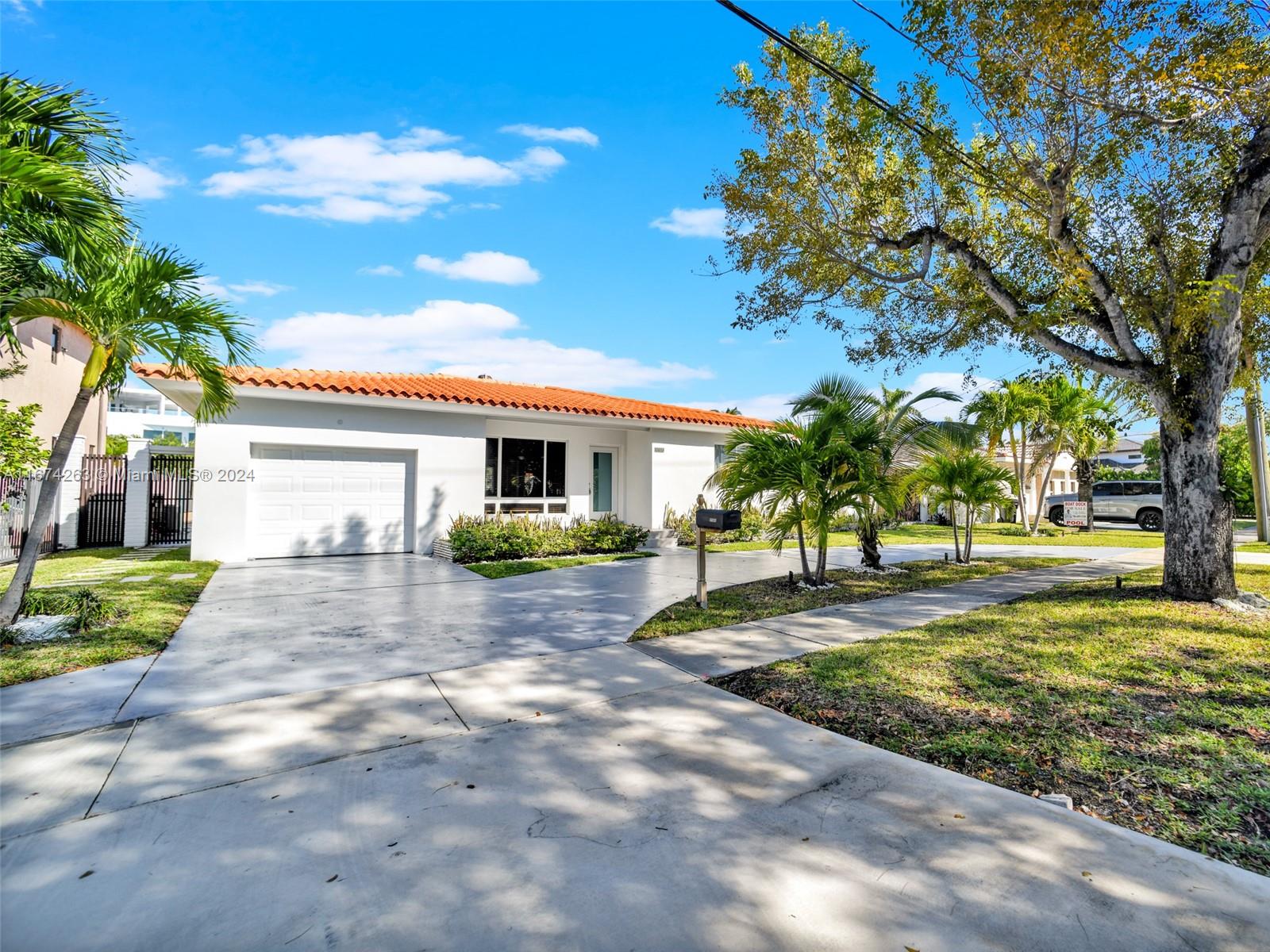 ***2212 Squarte feet under A/C ***Experience waterfront living at its finest with this stunning pool home in Keystone Island.* Boasting a private dock and no bridges to the bay, this home offers quick access to the ocean, making it a boater's dream. ***Featuring a separate 348 square foot detached guest house with waterviews*** Located in the highly sought-after 24-hour guard-gated Keystone Island, this home offers unparalleled security and privacy. Large lot size measures 75ft by 135 ft (10,125 sq.ft).