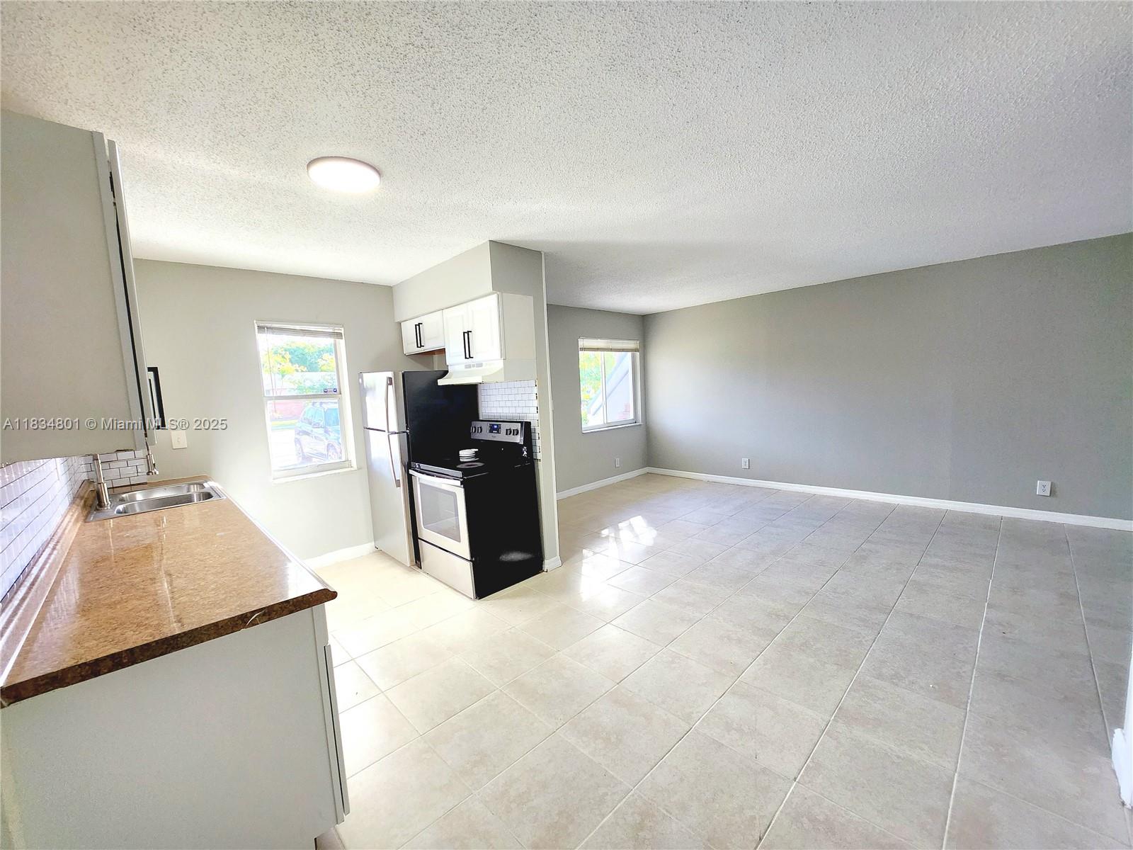SPECIAL MOVE IN COST! 1st months rent and sec. deposit moves you in. Beautiful recently updated Sunny 1 Bed 1 Bath apt. Spacious Livingroom, dinning area, includes Modern Kitchen with Stainless Steel Appliances, central AC, washer and dryer in unit, tile floors. Charming East Side neighborhood. The property is located in a great location, within minutes to FLL Airport, Beaches, Lauderdale by the sea, and other popular attractions. FAST APPROVAL PROCESS, 24 to 48 hours approval. (special for qualified applicants, ask for details) unit available August 1st. allow pets under 20 L.