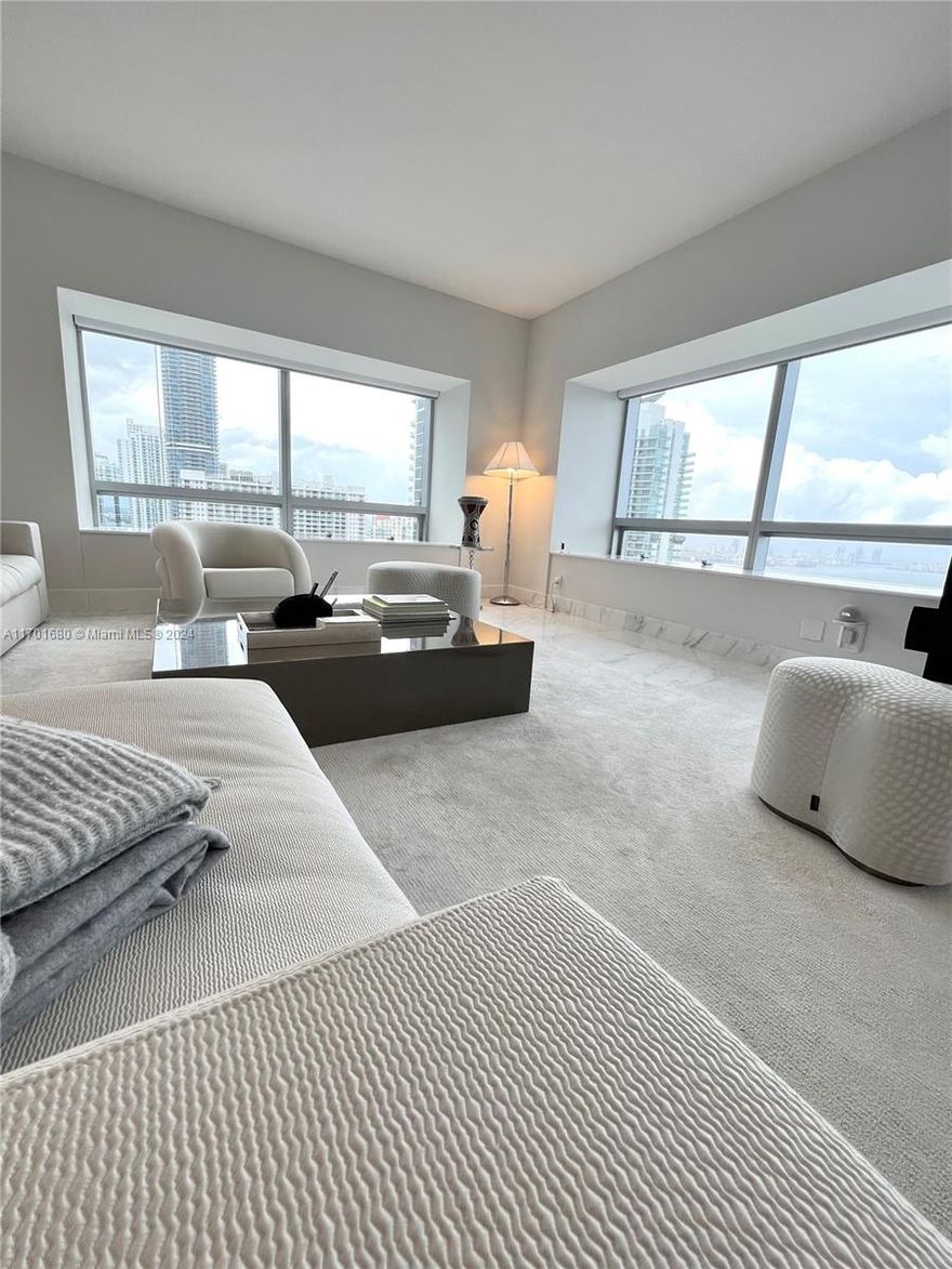 Located at Prestigious Four-Season Hotel & Residences Brickell. Elegant furnished 33rd floor, 1,801 sqft corner 2/2.5 BR apt, Best floor plan, higher floor, stunning water & city view. Full of natural light, meticulously maintained. Top of line appliances, custom high end furniture. Boutique style home. Bang & Olufsen TV, Armani Casa living-room, Artefacto Master Bedroom, Smart apartment with Control 4 system. controls lights, shades & Nest system for AC. Sonos Sound System throughout the apt. Each bedroom with on-suite bath. FS Hotel and Residences Brickell is a 5* resort with top amenities; 3 outdoor pools, 24hr concierge, 50,000 sqft Equinox fitness center, full-service spa, 24hr business center. In the heart of Brickell Within walking distance form Brickell City Center.