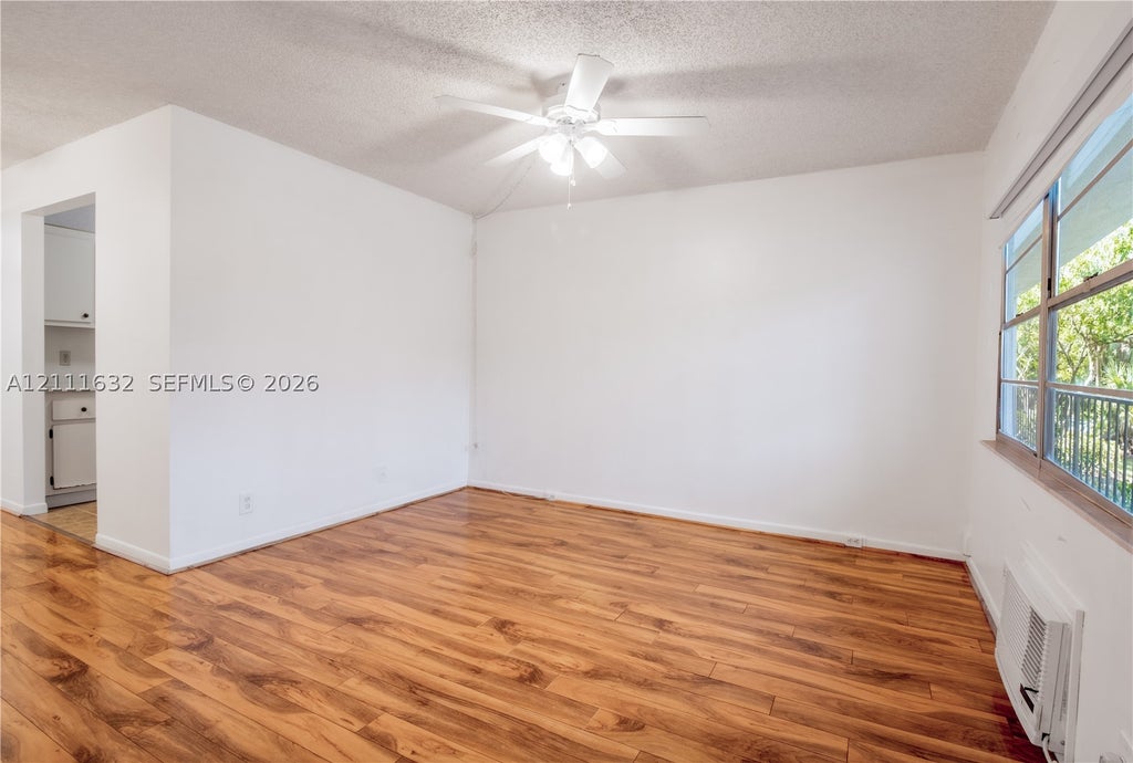 Photo of 13450 SW 3rd St #310D, Pembroke Pines, FL 33027 (MLS # A12111632)