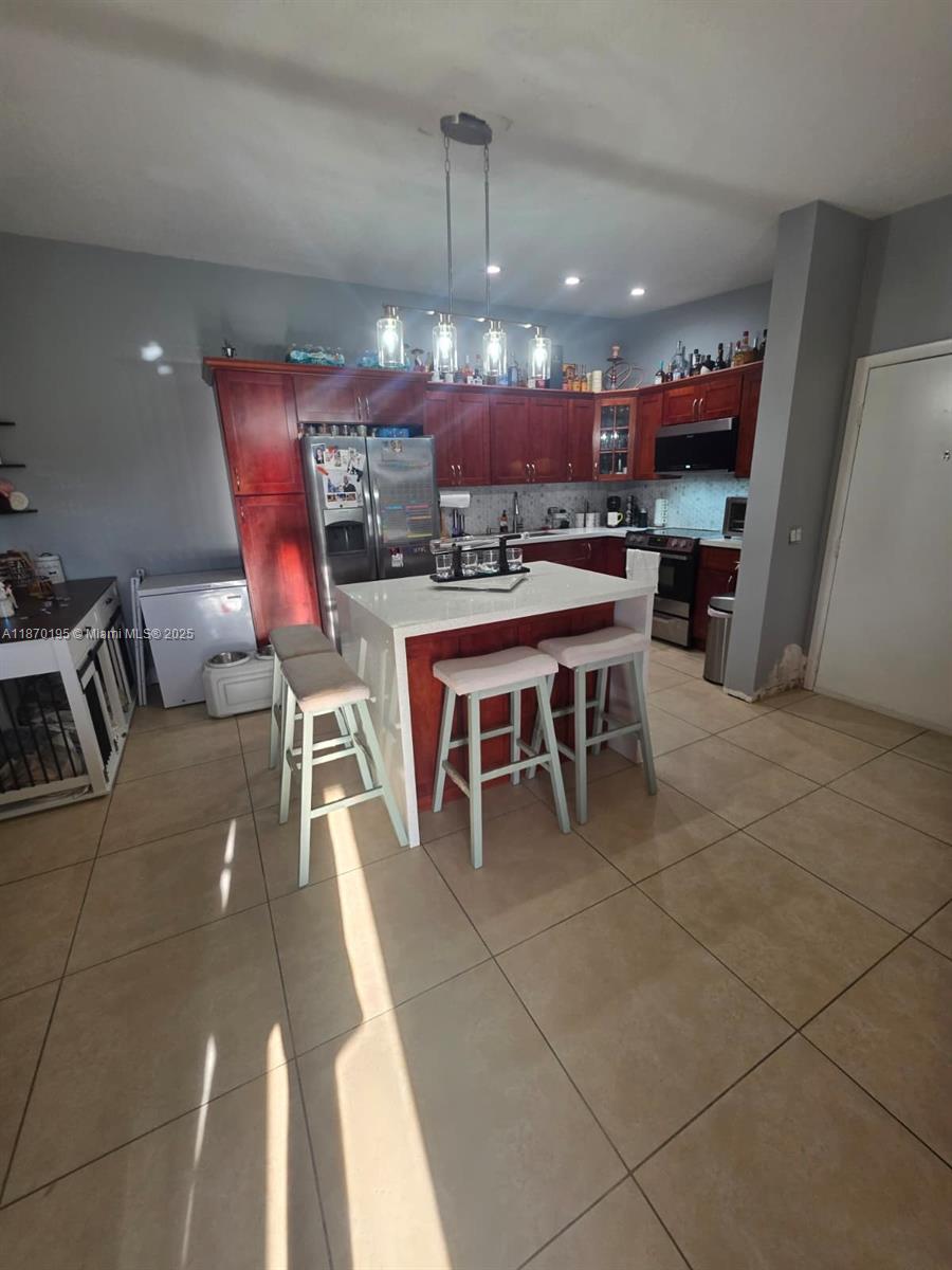 9727 Hammocks Blvd 207D