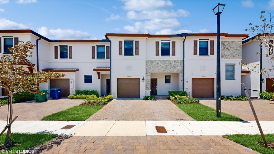 Welcome to your dream townhome nestled in the heart of Cutler Bay! This beautiful 2022-built 3-bedroom, 2-bathroom gem is ready to welcome you with open arms. As you step inside, you'll be greeted by an inviting open floor plan that effortlessly maximizes space and functionality. The brand new bathrooms are a highlight, boasting sleek finishes and contemporary fixtures to ensure your daily routine feels like a spa escape. Each bedroom is generously sized, offering a cozy retreat for relaxation. Perfectly located for your lifestyle, you're just moments away from shopping, dining, and entertainment, with convenient access to major highways for an easy commute. Ideal for busy professionals and families, this townhome is a modern paradise waiting for you to call it home.