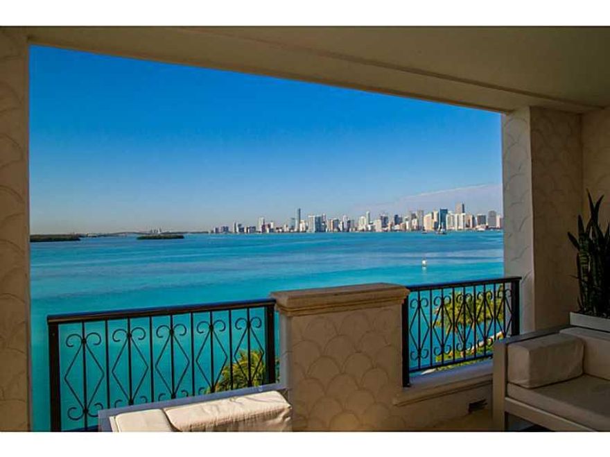 Fisher Islands Most Desired Bayview ~Building 50~  Fully remodeled oversized 3/3.1 is modern, elegant & sure to impress the most demanding of buyers. Open kitchen and limestone floors which flows into your inviting living space. Master suite boasts onyx s lab bath, duel walk in closets over sized deck & of course amazing sunset views. Guest rooms have walk in closets, baths w/sheets of designer glass giving a superior finished look. Includes 2 Auto,2 Golf Cart Spaces, as well as a/c storage. Easy to show ~