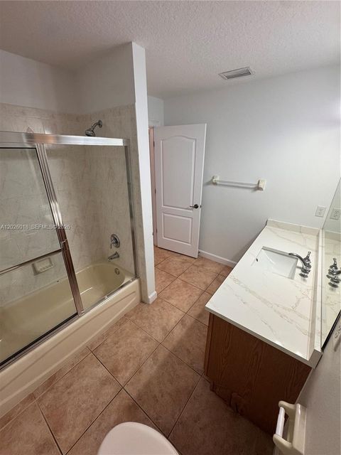 Tiny photo for 1074 SW Sultan Dr, Port St Lucie, FL 34953 (MLS # A12026018)