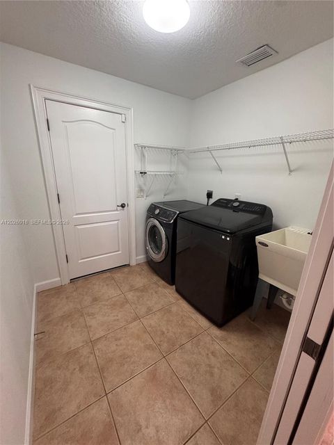 Tiny photo for 1074 SW Sultan Dr, Port St Lucie, FL 34953 (MLS # A12026018)