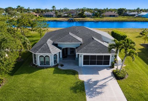 Photo of 1074 SW Sultan Dr, Port St Lucie, FL 34953 (MLS # A12026018)