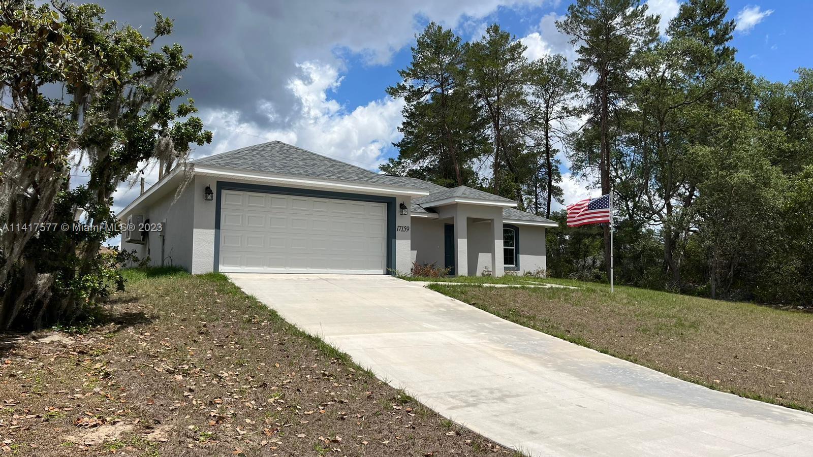 Brand New-Just Built beautiful single family home3 bedroom / 2 bath single family home offers a spacious split plan with cathedral ceilings in the living room and kitchen. Kitchen design features stainless appliances with stunning granite countertops to compliment the upgraded wood cabinetry featuring self-closing drawers and doors! You will enjoy entertaining in this kitchen with its eight-foot serving counter and sliding door leading to attached, enclosed lanai! Master bedroom is spacious and features a walk-in closet with a custom tiled master bath and wood cabinetry with granite counters! All wet areas are tiled in ceramic tile with carpet in the living areas. Two car garage boasts painted interior, epoxy flooring, and two auto garage remotes.