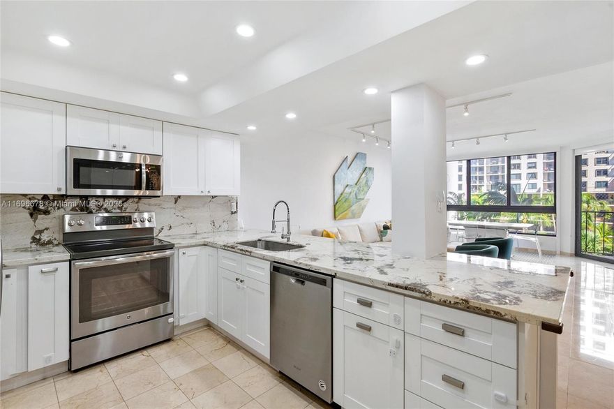 UNIQUE opportunity to own a fully upgraded, spacious, move-in-ready 3 bed/3 bath Apt. in Brickell Key Island with 1,624 sf. This stunning residence has 3 parking spaces, one being a private covered garage w/ extra storage. Light-filled with an open floor plan, new impact windows,  modern open kitchen, ample closets, and spacious laundry room. The expansive balcony is the perfect spot to relax and enjoy the bay , inner gardens,  fountain view and sunsets! Brickell Key One Building is a classic double gated community offering exceptional amenities like: Pool, Tennis & Basket courts, Gym, Kids room, Pet yard, complementary valet and more.. Schedule your showing NOW to call this place HoMe. Best price value deal in Brickell!
