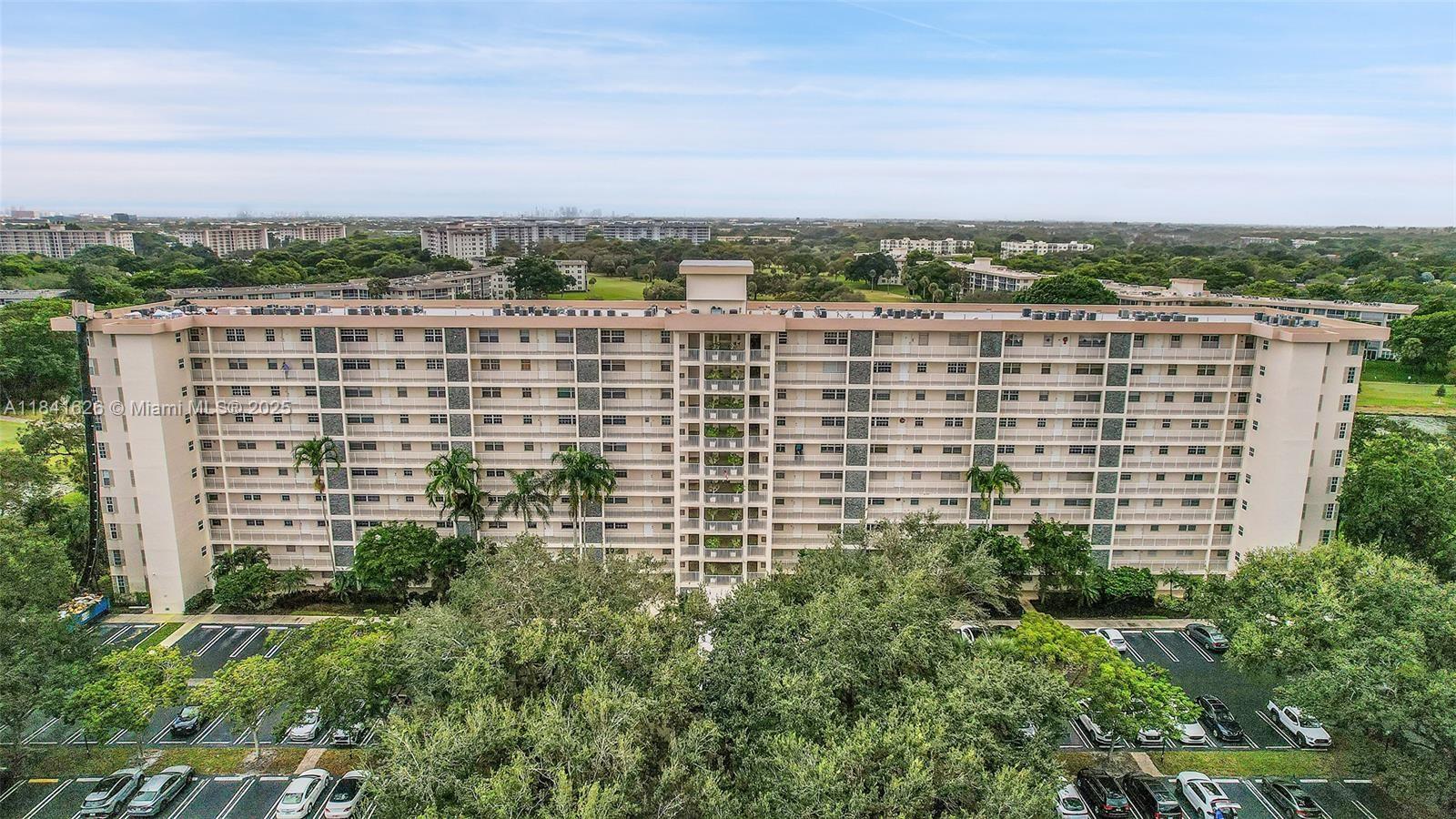 Light and bright 1st-floor condo in one of Palm Aire’s most desirable locations, offering a stunning golf course view from the screened-in sun porch. This 2-bedroom, 2-bathroom home is well-maintained and move-in ready, featuring impact windows facing the green and spacious, sun-filled living areas. Enjoy resort-style amenities including an oversized swimming pool, outdoor dining and grilling areas, clubhouse, gym, and library. Conveniently located within walking distance to tennis and basketball courts, the community center, and Palm-Aire Publix, with extensive walking and biking trails throughout the neighborhood. Just minutes from the beach by car, the HOA covers 24-hour security patrol, video surveillance, cable, internet, water, trash removal, and building insurance. All ages welcome!