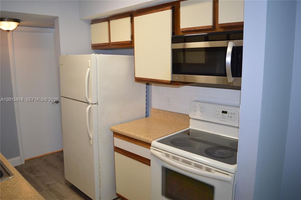 Photo of 5740 Rock Island Rd #292, Tamarac, FL 33319 (MLS # A12015424)