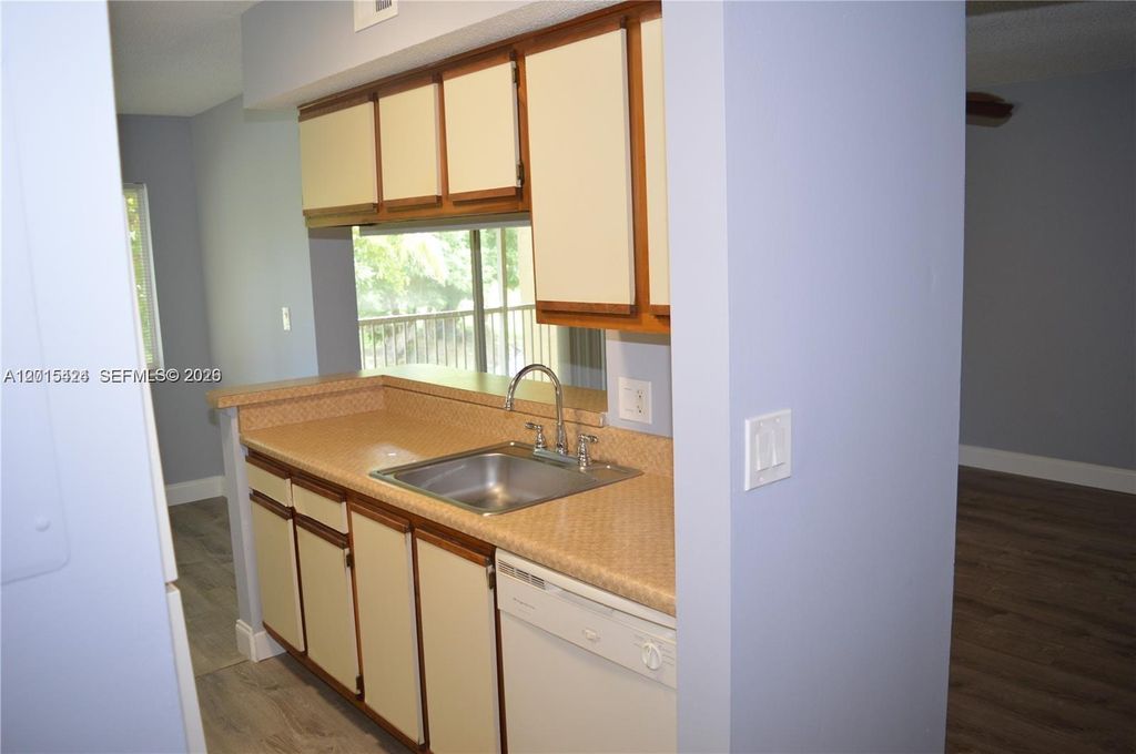 Photo of 5740 Rock Island Rd #292, Tamarac, FL 33319 (MLS # A12015424)