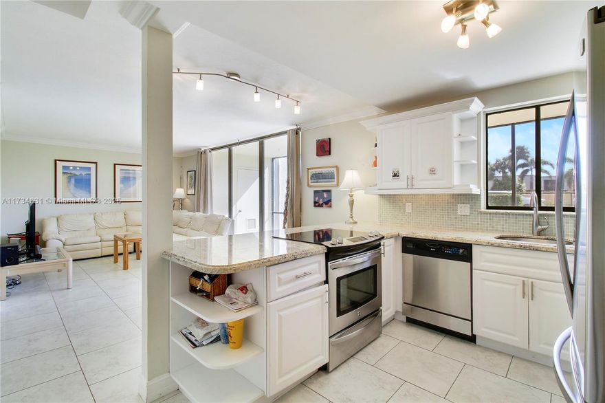 LOCATION! LOCATION! LOCATION! Discover this charming first-floor 1-bedroom, 1.5-bathroom condo w/in walking distance of Jupiter's pet-friendly beach. Designed with an open-concept layout, it features a renovated kitchen, pantry, laundry room & tile flooring throughout. Enjoy SE exposure from the spacious screened patio, which also includes a convenient storage closet. The generous primary bedroom offers an en-suite bath, while the additional half bath adds extra convenience.  Your assigned parking space is just steps from your front door for ultimate convenience. Recent updates include disposal 2024, microwave 2023 & AC 2022. Ideally situated near beaches, dining, shopping, fishing piers, golf & more-this is coastal living at its finest! Purchaser can lease post-purchase. 2 pets permitted!