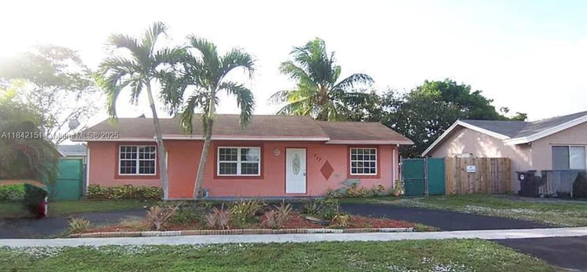 Welcome to your new home! This spacious and well-maintained 3-bedroom, 2-bathroom property is perfect for families looking for comfort, convenience, and community. Featuring elegant tile flooring throughout, the home offers a clean and modern feel with plenty of natural light. The large, park-like backyard provides a safe and open space for children to play and enjoy the outdoors. A circular driveway adds ease and charm, with ample parking for multiple vehicles. Located in a quiet and peaceful community, this home is just minutes away from schools, churches, and shopping centers — making everyday errands and routines effortless. Whether you're raising a family or simply seeking a serene place to call home, this rental has everything you need. Section 8 welcome.
