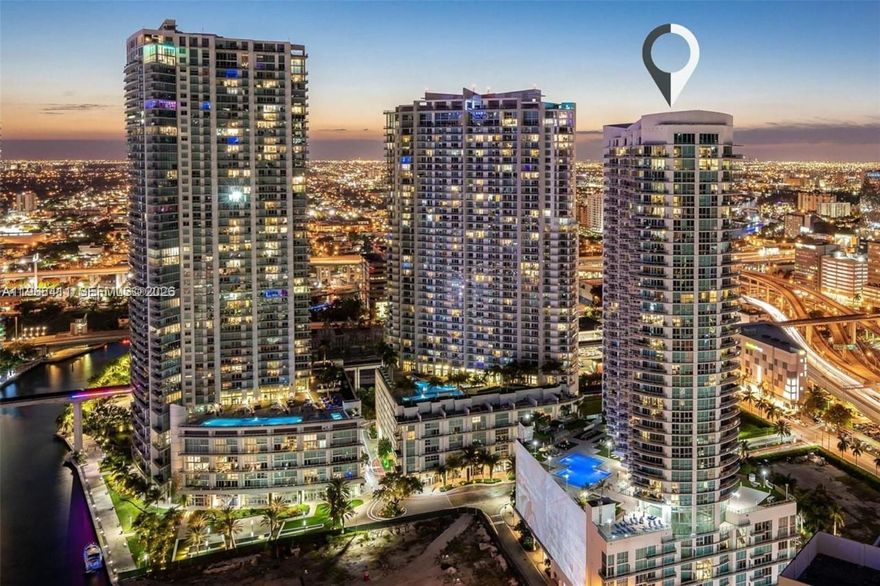 Rare opportunity to own a truly unique residence at Wind Brickell, a unit that stands apart from all others in the building. This home has been substantially and tastefully remodeled with high-end finishes, including a complete kitchen transformation with glossy white cabinetry, new hardware, sinks, mirrors, smart lock, and the addition of a kitchen island for enhanced functionality and space. Modern LED lighting, a custom-made closet with barn door, and refined contemporary details elevate the entire residence.This beautifully furnished 2-bedroom, 2-bathroom home offers breathtaking city and water views of Brickell and the Miami River through elegant glass doors, complemented by a wrap-around balcony ideal for relaxing and entertaining. The layout, finishes, and design make this apartment truly unlike any other unit in the building.Residents enjoy state-of-the-art amenities, including a resort-style pool, jacuzzi, fully equipped gym, racquetball court, movie theater, arts room, and more. Gated community with 24/7 security and attended lobby.Unbeatable location in the heart of Brickell/Downtown—walking distance to the free Metromover, Brickell City Centre, Bayside, Miami Riverwalk, Mary Brickell Village, and top restaurants, bars, and entertainment. An exceptional opportunity for end users or investors seeking a turn-key luxury residence in one of Brickell’s best locations.