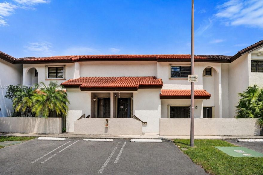 Beautifully updated and meticulously maintained 2 bed, 2.5 bath 2-story townhome in the desirable L’Ambiance community in the heart of Kendall! This move-in ready home features a bright, open layout with modern flooring and a clean, contemporary feel throughout. The spacious living and dining areas flow seamlessly into the kitchen, perfect for both everyday living and entertaining. Upstairs offers two generously sized bedrooms, each with its own ensuite bathroom. The primary suite features a split bathroom layout with separate shower and toilet area, plus a sink and vanity space, along with a large walk-in closet with built-ins. A convenient half bath is located downstairs. Enjoy an exceptionally large, clean outdoor patio ideal for entertaining, along with a welcoming front patio that includes a generous storage and utility closet. Many recent updates including a newer roof, appliances, water heater, and more provide peace of mind. Full accordion shutters throughout. The association covers exterior maintenance, roof, and pest control, and the community offers a pool. Includes two assigned parking spaces plus ample guest parking nearby. Ideally located near major roads, shopping, dining, and top-rated schools. Low maintenance living with strong owner pride throughout. Clean, well cared for, and truly move-in ready, don’t miss this opportunity!
