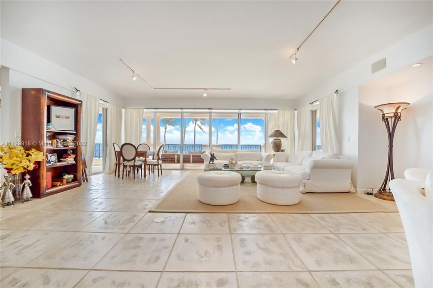 GORGEOUS OCEANFRONT RESIDENCE. STUNNING BAHAMIAN LIMESTONE FLOORING THROUGHOUT LIVING AREAS WITH CARPETED BEDROOMS. THIS UNIT IS TASTEFULLY DECORATED AND FURNISHED. BEAUTIFUL KITCHEN WITH OVERSIZED WINE COOLER FRIDGE.  STUNNING VIEWS FROM THE OPEN BALCONY FACING YOUR PRIVATE BEACH, WHERE YOU CAN ENJOY YOUR CUP OF COFFEE OR GLASS OF WINE IN THE EVENING, RELAXING BY THE OCEAN BREEZE. LUXURIOUS FISHER ISLAND, LIVE IN YOUR PRIVATE PARADISE.