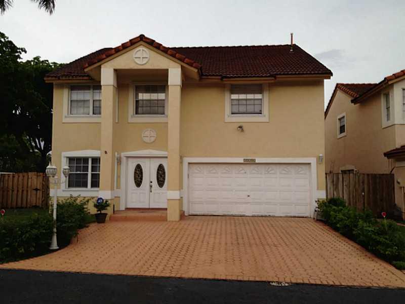 Gorgeous 2 story home in the quiet, gated community of Vizcaya at the Hammocks. This lovely home has 4 bedrooms, 2&1/2 bathrooms, 2 car garage, and over 2,350 sq ft of living space. Kitchen and bathrooms were remodeled last year with a very modern and exq uisite style. Crown molding throughout the entire house. A/C and water heater are less than 6 years old. This is the perfect home for a family with A+ schools in the area and more than 9 miles of walking/biking trails throughout the Hammocks Community.
