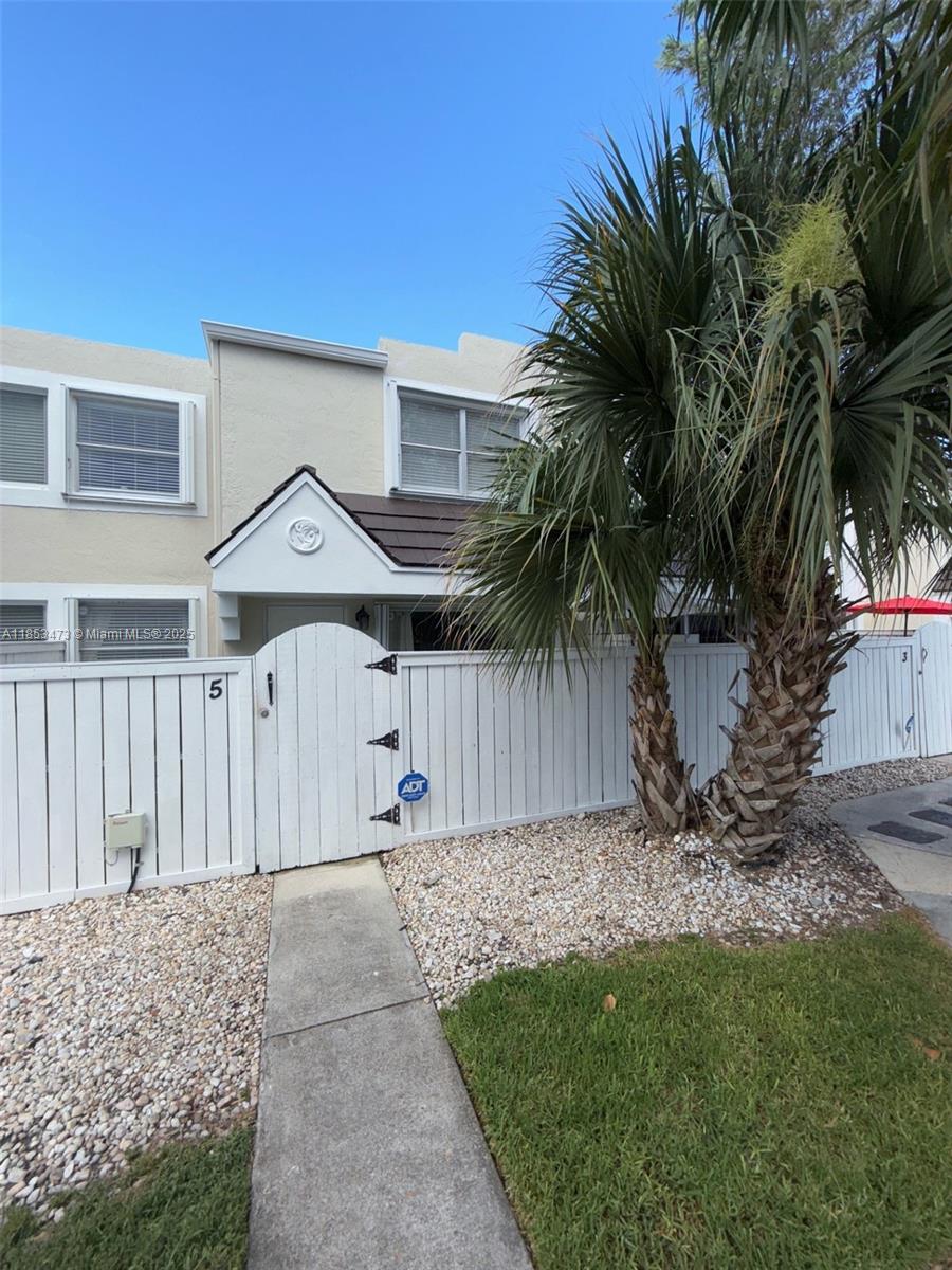 A boutique style townhome is awaiting your company. This 2/2.5 updated resort offers above the standard rental. Welcome your guests thru the artificial grass terrace, giving your guest a quick glimpse of what to expect next. Once inside, you’ll enjoy recently updated wood floors throughout. Next, your eyes will veer towards the renovated kitchen w/ clean, but modern, white cabinetry & black hardware pulls. Enjoy meals at the pull up bar or your very own dedicated dining area. While downstairs, you can open the terrace slider to inside/out living for you & your guests to enjoy. Privacy remains, as each large bedroom, each with its own ensuite, is located on the second level. Don’t miss this opportunity as it is located in the heart of the city, alleviating you from long commutes to town.