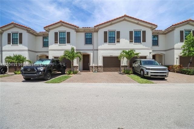 Photo of 2014 Sugar Maple Dr #2014, Riviera Beach, FL 33410 (MLS # A12045159)