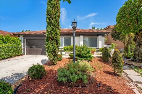 Photo of 18625 NW 53rd Ave, Miami Gardens, FL 33055 (MLS # A12053867)