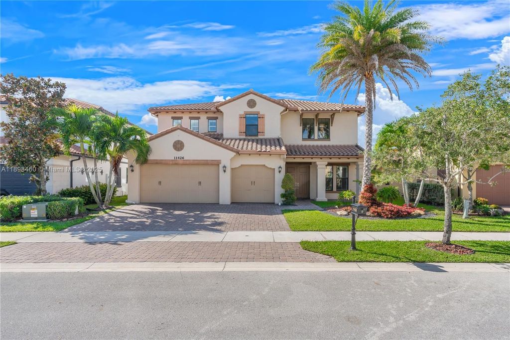 Photo of Parkland, FL 33076 (MLS # A11898460)