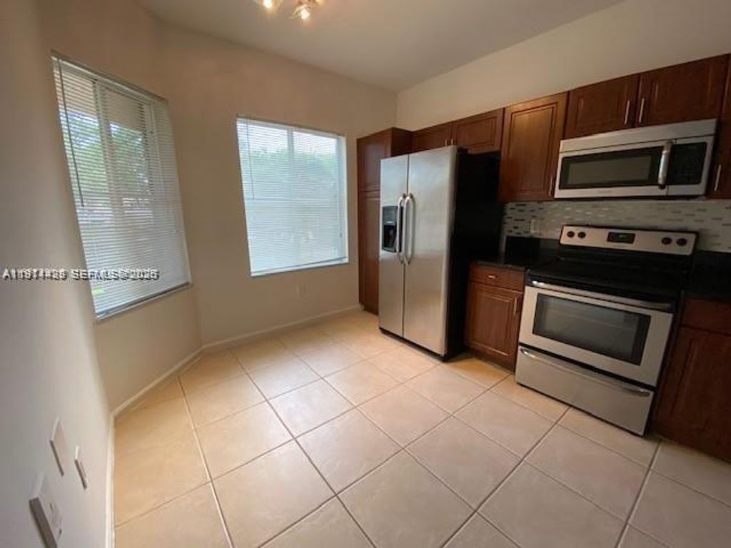 Photo of 2708 SW 83rd Ave #105, Miramar, FL 33025 (MLS # A11974438)
