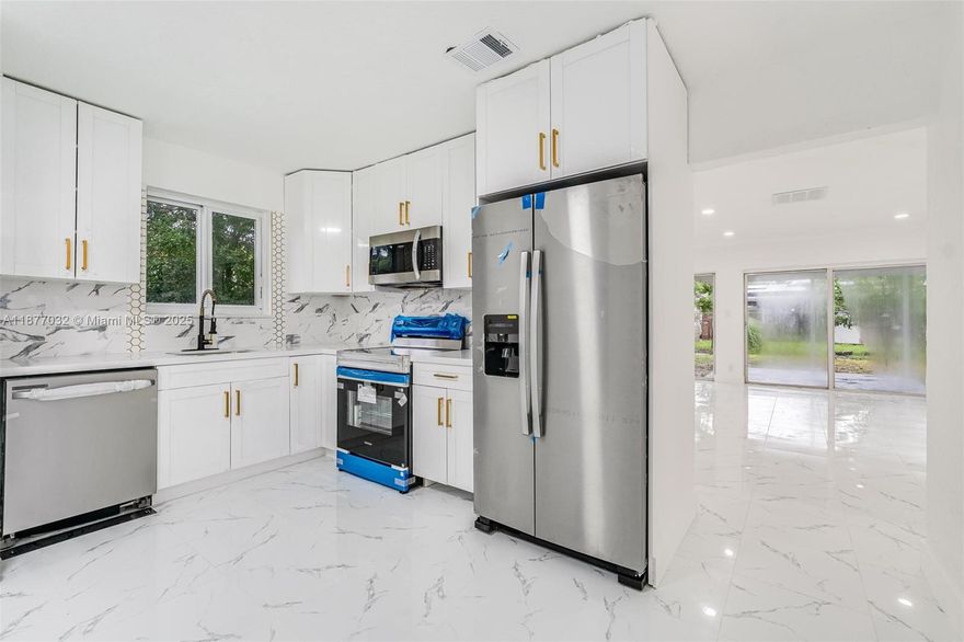 Move right in to this fully updated 3-bedroom, 2-bath single-family home. Featuring brand-new flooring, fresh interior and exterior paint, and a sleek white-and-gray modern design throughout. The kitchen is completely remodeled with contemporary finishes, while both bathrooms have been stylishly upgraded for a clean, modern look. Enjoy energy savings with the installed solar panels. This spacious home offers an open feel and plenty of natural light, perfect for comfortable living. Priced affordably, it’s an excellent opportunity for first-time home buyers or anyone looking for a move-in-ready property in a convenient Lauderhill location. Don’t miss out—schedule your showing today!