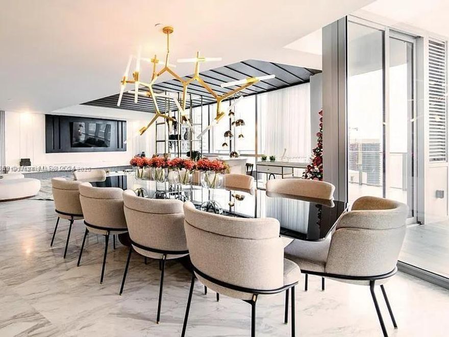 Luxurious and highly desirable 5 Bed + 4.5 bath residential Condo with a very large terrace at the Paramount Miami WorldCenter, the private foyer opens to a split bedroom floorplan featuring: a kitchen with Quartz waterfall edge island, Bosch & Subzero appliances, & Italian cabinetry a master suite with a spa-like bathroom with a walk-in shower & large soaking tub. Basketball Half-Court, Racquetball Court, Relaxation Areas: Conservatory, Relaxation Lounge, Spa/Salon, Indoor Sports Center(State-of-the-art Fitness Center, Boxing Studio, and Aerobics Area), Entertainment Center. It is conveniently located next to I-95 and I-395.