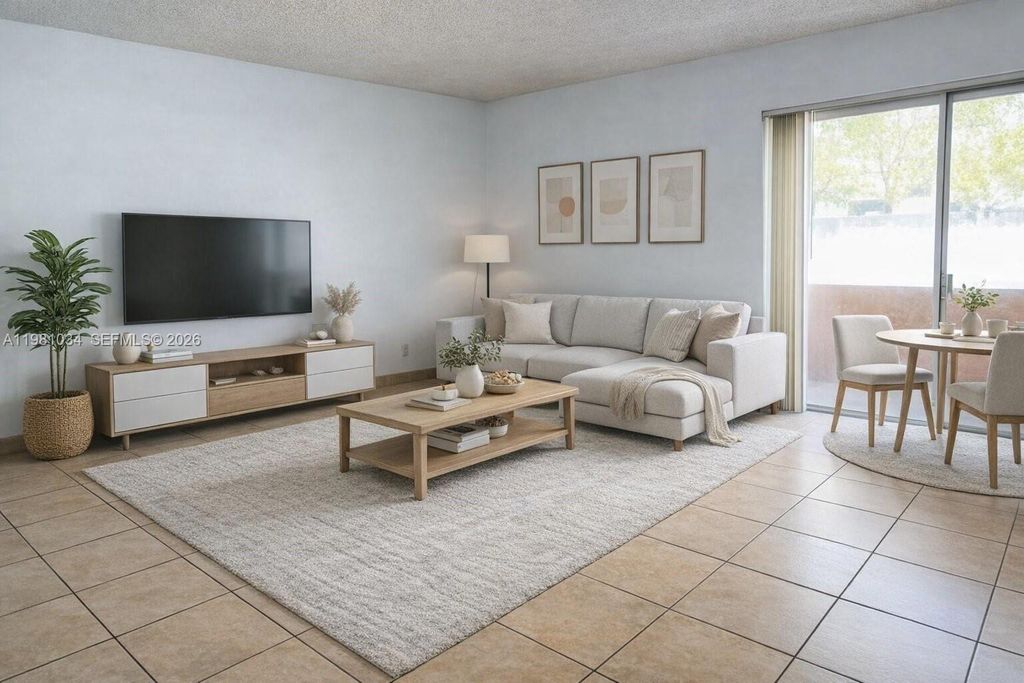 Photo of 3221 Sabal Palm Mnr #103, Davie, FL 33024 (MLS # A11981034)