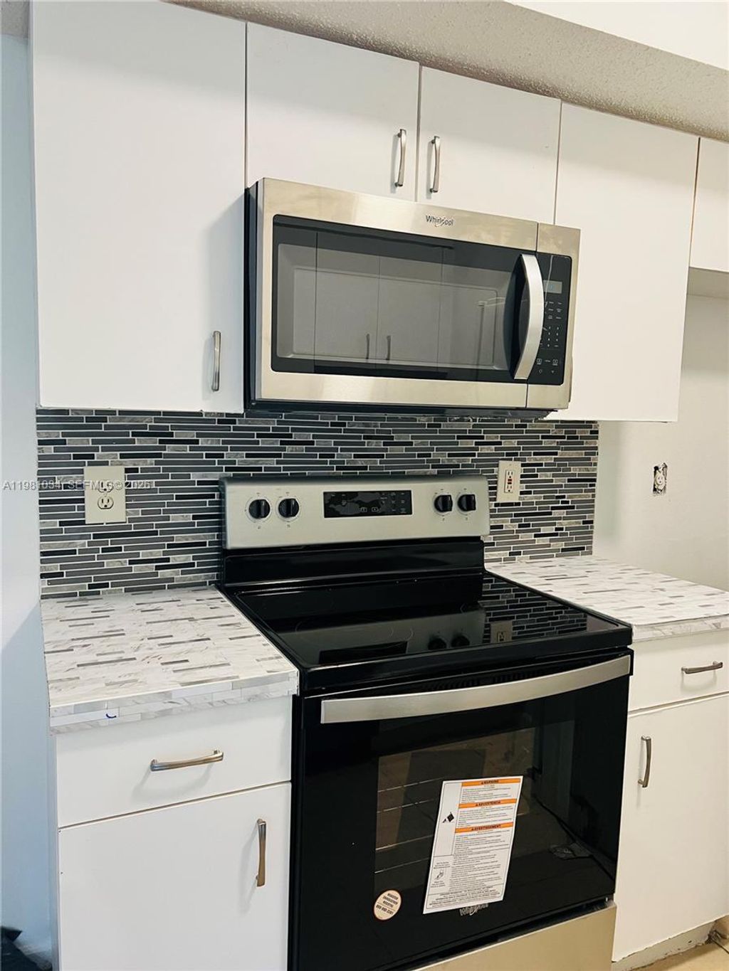 Photo of 3221 Sabal Palm Mnr #103, Davie, FL 33024 (MLS # A11981034)