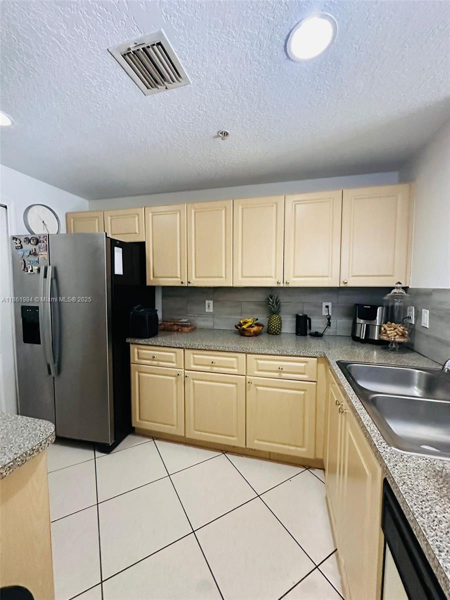 Bright and spacious 3 Bedroom, 2 Bathroom condo at The Courts at Doral. This well-maintained unit features a functional open layout, tile, walk-in closets, and a private balcony with serene views. Located in a secure, gated community with 24/7 security, pool, clubhouse, and playground. Includes two assigned parking spaces plus guest parking. Perfectly situated near top-rated schools, shopping, dining, Miami International Airport, and major highways. A must-see home offering comfort, convenience, and style.