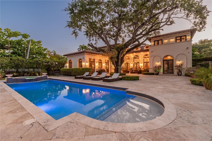 Spectacular Mediterranean-inspired estate in the highly coveted Pinecrest community. Nestled on a beautifully landscaped, oversized 0.73-acre lot, this custom masterpiece offers unparalleled luxury living with 9 bedrooms and 9+ bathrooms. Grand foyer with soaring ceilings welcomes you into a two-story layout featuring marble and wood floors, a chef’s kitchen with high-end appliances, elegant living and dining spaces, media/theater room, wine cellar, and elevator. Resort-style outdoor living with pool, spa, lush gardens, and multiple entertaining areas. Property includes 2 separate guest houses, each with 1 bedroom, 1 bathroom, and full kitchen, plus a separate in-law suite with ensuite bathroom. Abundant parking with 4-car garage. Prime location near top-rated schools and premier dining and shopping. A true Pinecrest showpiece.